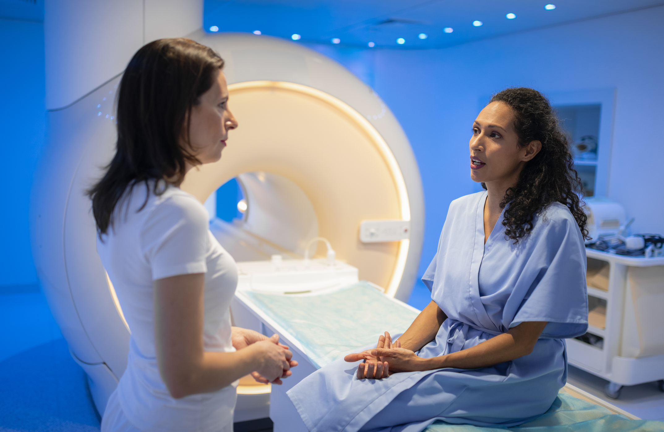 Doctor Giving Information To Woman Before Examination